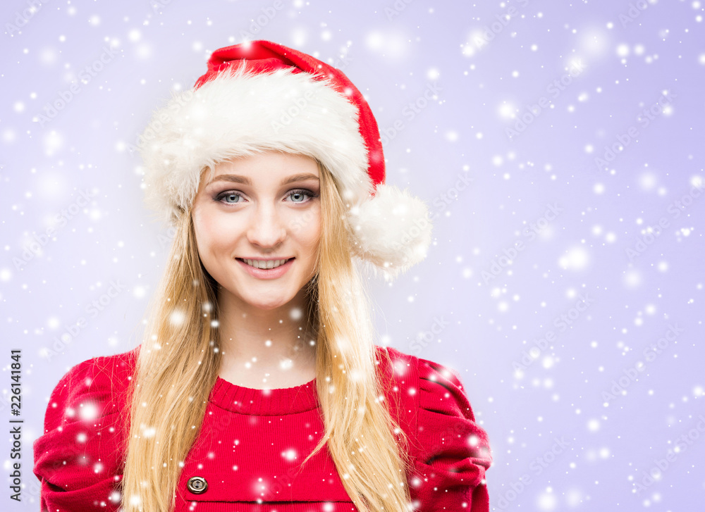 Young and beautiful girl in a Christmas hat. Winter concept. Young and beautiful girl in a Christmas hat. Winter concept.