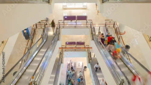 Zoom Timelapse of escalators motion in shoping mall