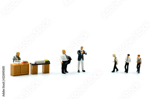 Miniature people : Buisnessman to interview of office using for concept Job Action Day.