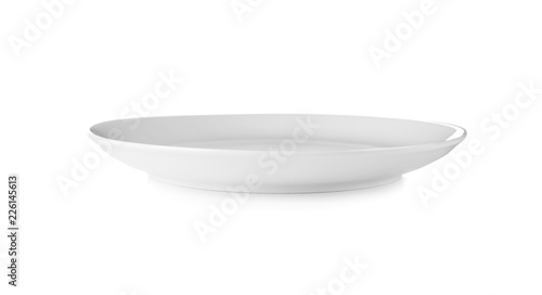 Ceramic plate on white background. Washing dishes