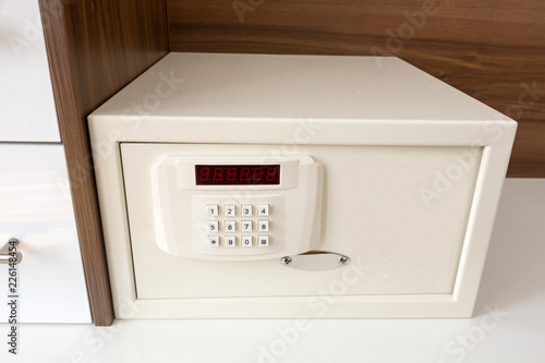 White security safe in hotel room
