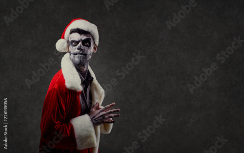Santa Claus is a wizard with a skull on Christmas against the background of the corpsepice.