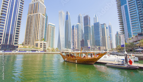 boats and modern buildings in Dubai Marina, United Arab Emirates