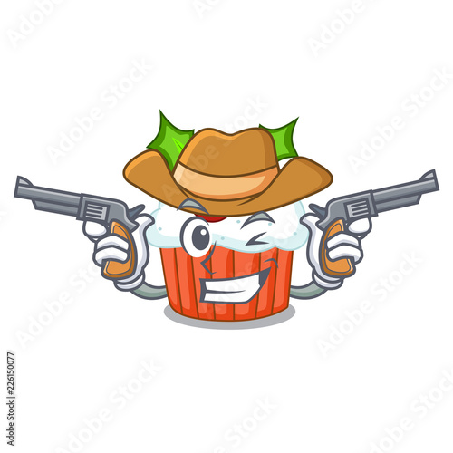 Cowboy character christmas cupcake with holly berry