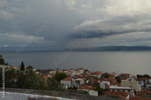 Mountain Village at the edge of Sea with Clouds