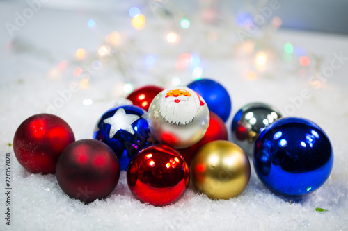 Christmas balls in the snow, background