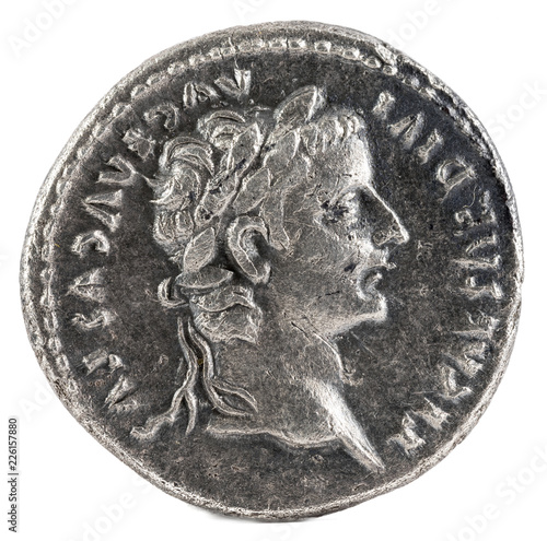 Ancient Roman silver denarius coin of Emperor Tiberius. Obverse. photo