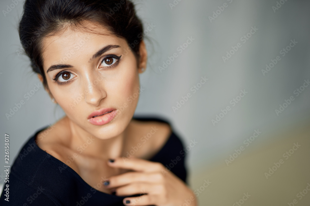 beautiful woman with make-up looking at the camera portrait beautiful woman with make-up looking at the camera portrait