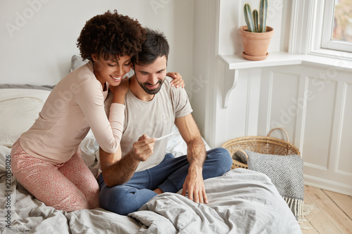 Фотография Pregnancy news and family concept