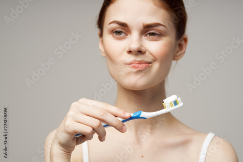 toothpaste toothbrush mouth care woman