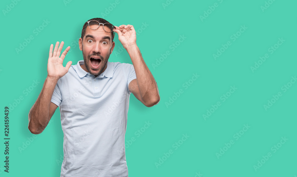 Amazed young man shouting Amazed young man shouting