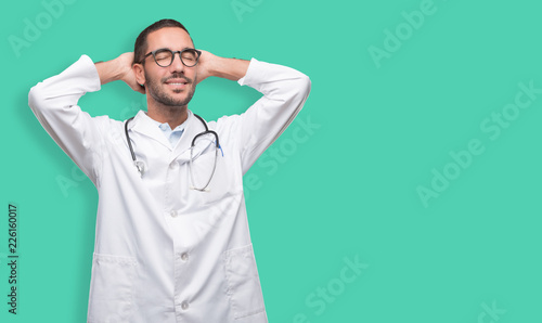 Valokuva Happy young doctor with a relax gesture