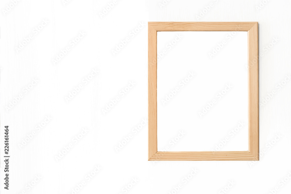 Blank light wooden frame for picture hanging on white wall. Realistic vector illustration Blank light wooden frame for picture hanging on white wall. Realistic vector illustration