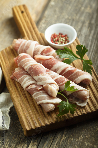 Sausages wrapped with bacon