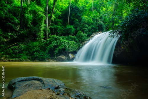 Beautiful Waterfall in Thailand.Scenic waterfall in tropical forest background.