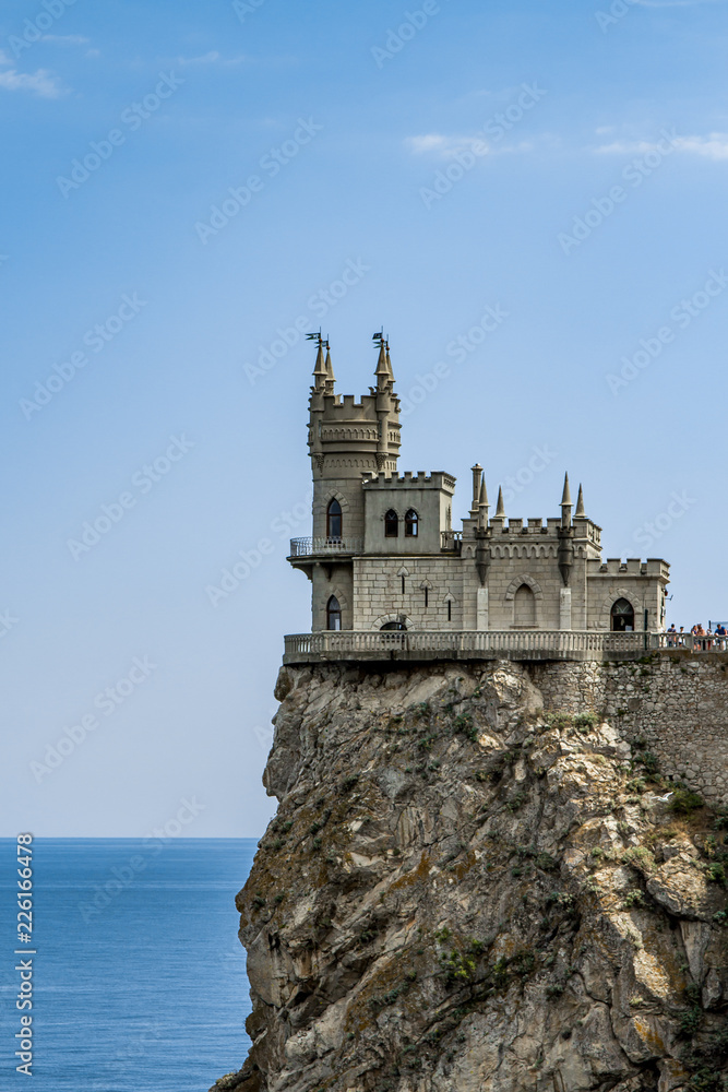 Amazing castle Swallow's Nest on a rock at the Black Sea, Crimea. Scenic panoramic view of Crimea southern coast. Architecture and nature of Crimea