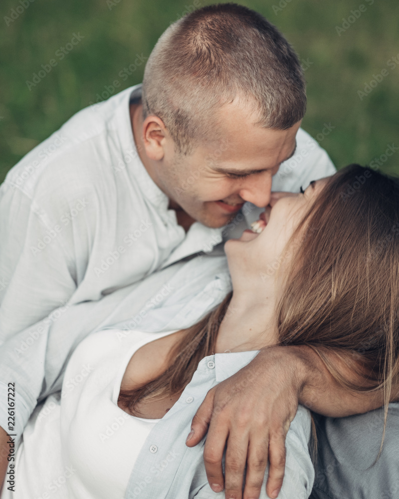 Outdoor Portrait of Young Couple in Love Outdoor Portrait of Young Couple in Love
