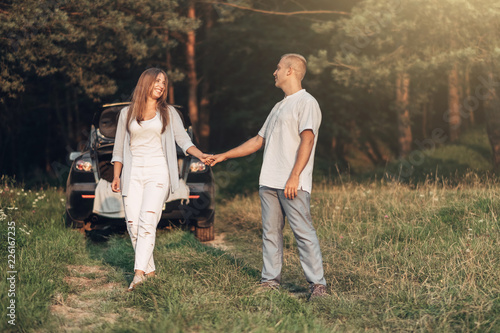 Outdoor Portrait of Young Couple in Love