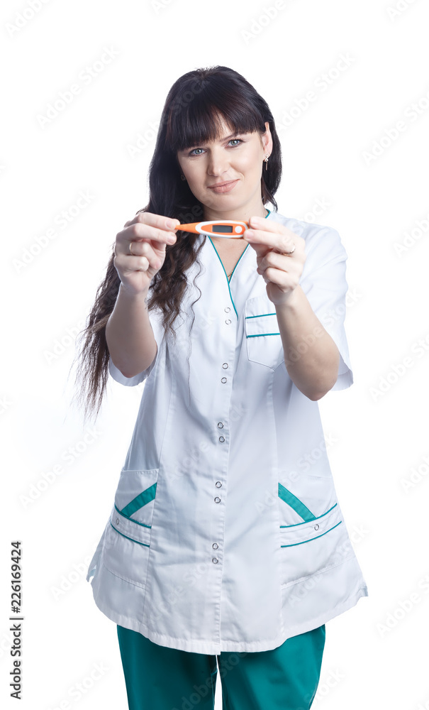 Middle-aged nurse doctor woman in a medical white and green uniform isolated on the white background holding a thermometer measuring temperature Middle-aged nurse doctor woman in a medical white and green uniform isolated on the white background holding a thermometer measuring temperature