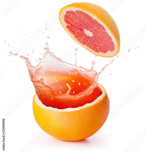 grapefruit juice splashing isolated on white background