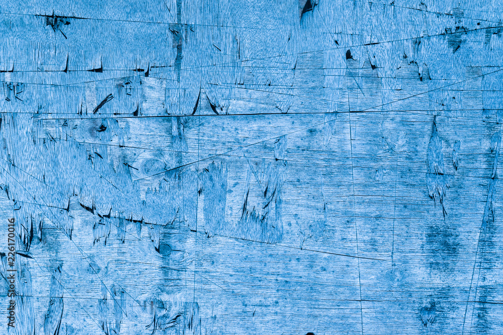 Obraz premium Blue plywood wall scratch texture. for text or background.