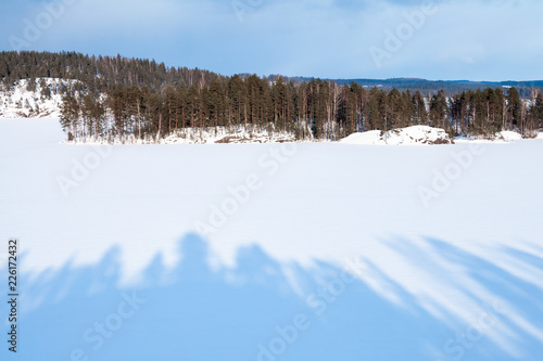 Coastal winter landscape of Saimaa lake © evannovostro