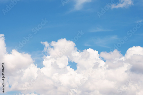 Clouds floating together in blue sky