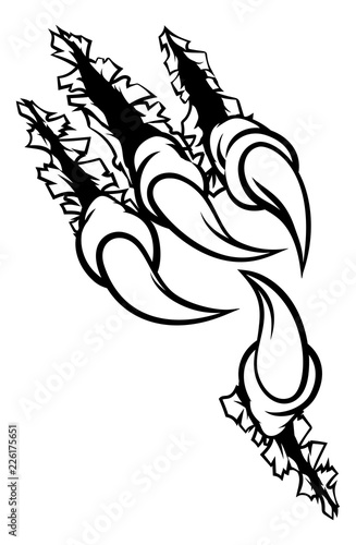 An eagle claw ripping and tearing through the background black and white