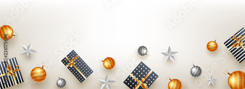 Website header or banner design, top view of gift boxes, stars and baubles on shiny background with space for your text.