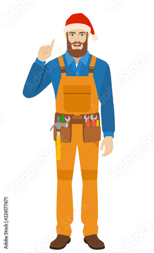 Worker in Santa hat pointing up