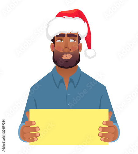 African man in hat holding blank card