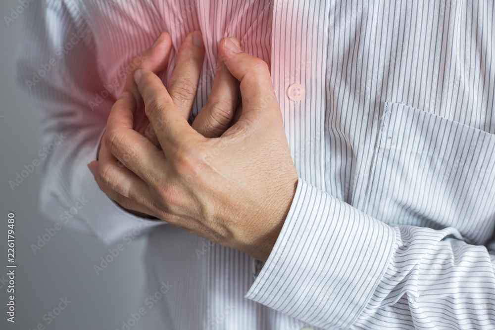 A Man having chest pain, heart disease.