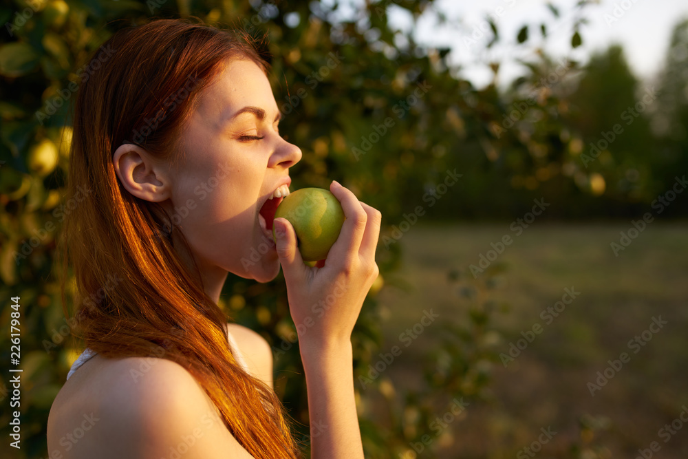 woman eating an apple woman eating an apple