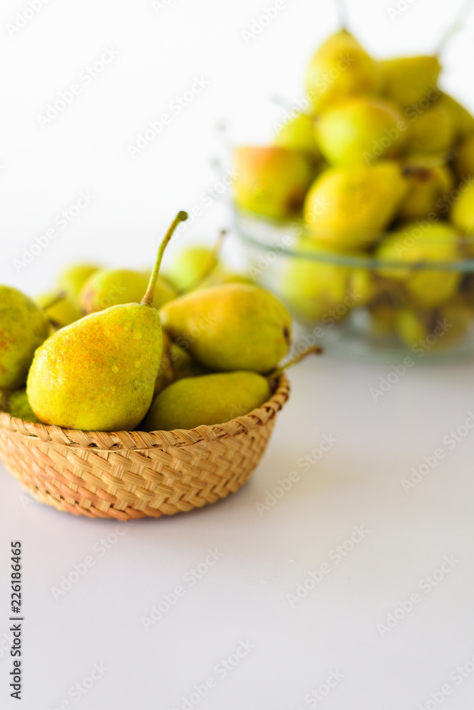 Fresh pears on white table Fresh pears on white table