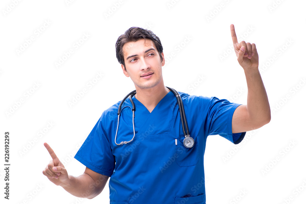 Young male doctor pressing buttons isolated on white Young male doctor pressing buttons isolated on white