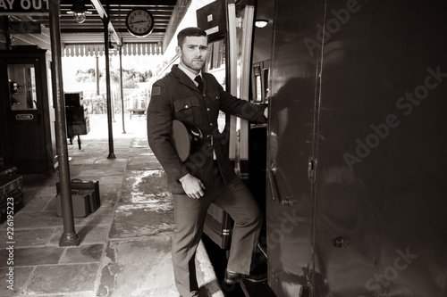 Good looking ww2 male air force officer in uniform boarding train