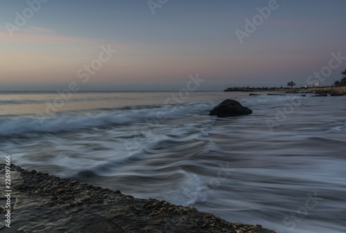 Meeting the sunrise on the beach.