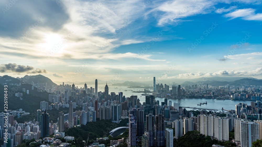 Obraz premium View of Victoria Harbour and skyscrapers from the panoramic point The Victoria Peak, Hong Kong.