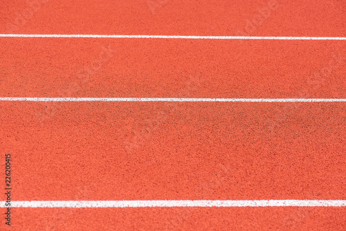 Close up of Running track pattern background in stadium.