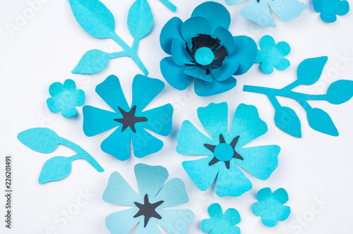 Flower and leaf of blue color made of paper