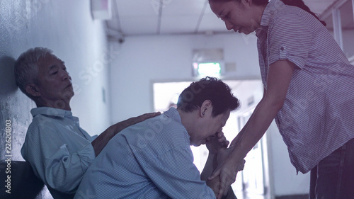 Patient family waiting for doctor in hospital worry sad and stress photo