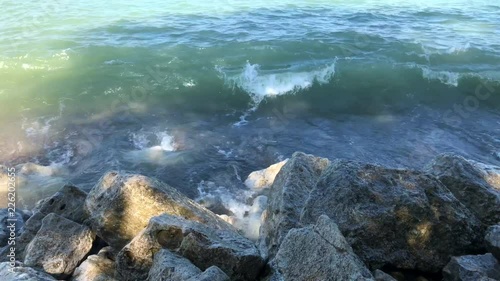 water hitting rocks photo