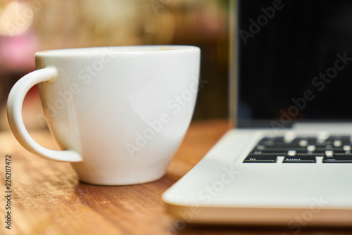 Laptop with Cup
