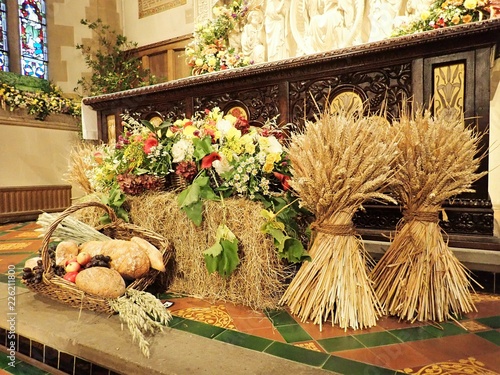 Traditional harvest festival altar in English Anglican church photo