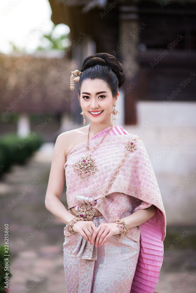 Beautiful Thai girl in Thai traditional costume. Beautiful Thai girl in Thai traditional costume.