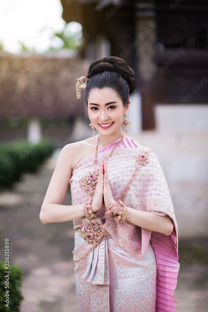 Beautiful Thai girl in Thai traditional costume. Beautiful Thai girl in Thai traditional costume.
