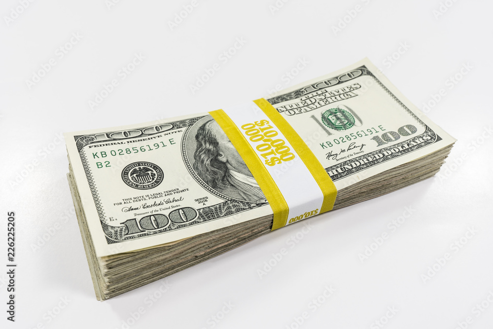 Pack of one hundred bills with $10000 paper currency strap. Pack of one hundred bills with $10000 paper currency strap.