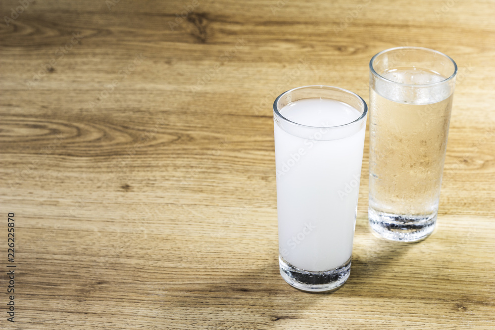 Turkish raki on wooden table Turkish raki on wooden table