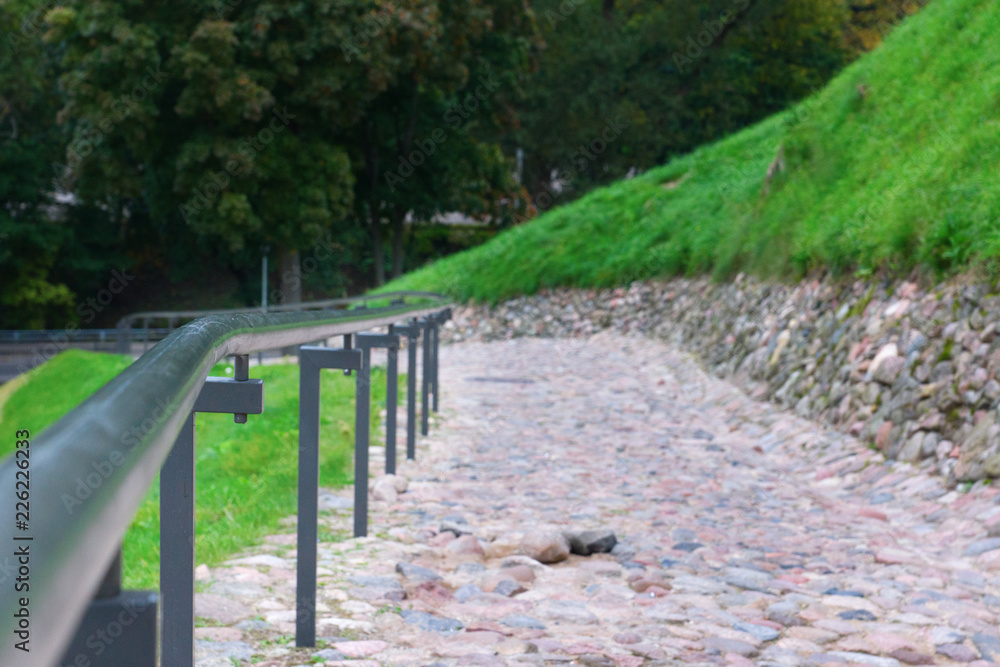 railings along the paved road