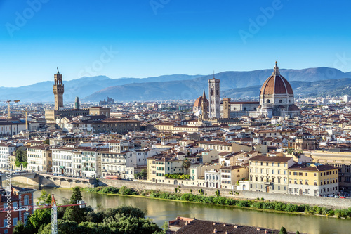 Panoramic view of Florence, Italy viewed from Piazzale Michelangelo before sunset with the view of Arno river. © Suradech